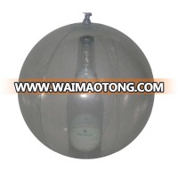 Plastic inflatable beach ball with 3D bottle inside